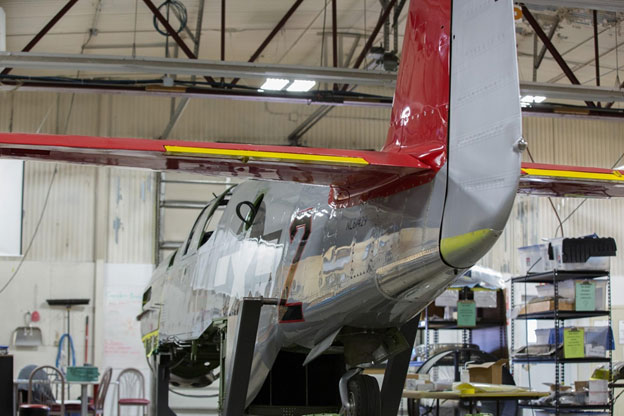Rear view shows the red horizontal and vertical stabilizers, the rudder will become red when the entire Mustang is repainted.