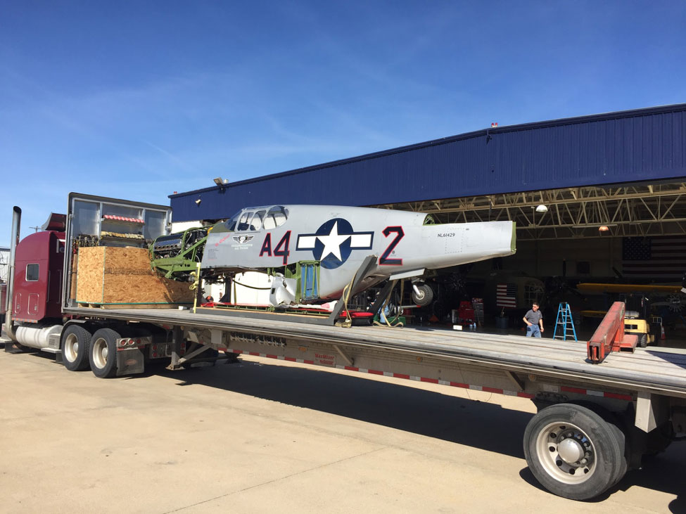 The fuselage and wings were loaded on separate trucks for the 1,167 mile trip to Bemidji.