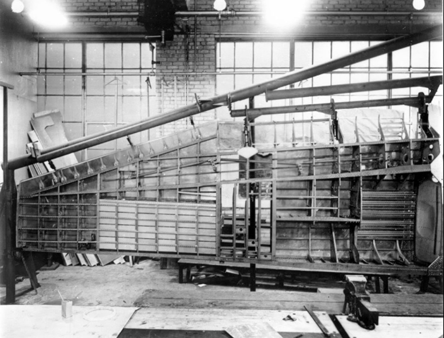 A P-47 wing in its fixture at the Evansville, Indiana Republic factory. Photo courtesy Harold Morgan