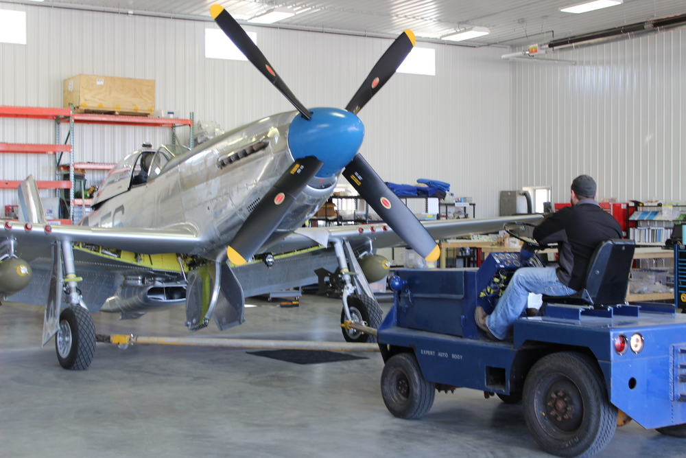 Towing Sierra Sue II out of the hangar