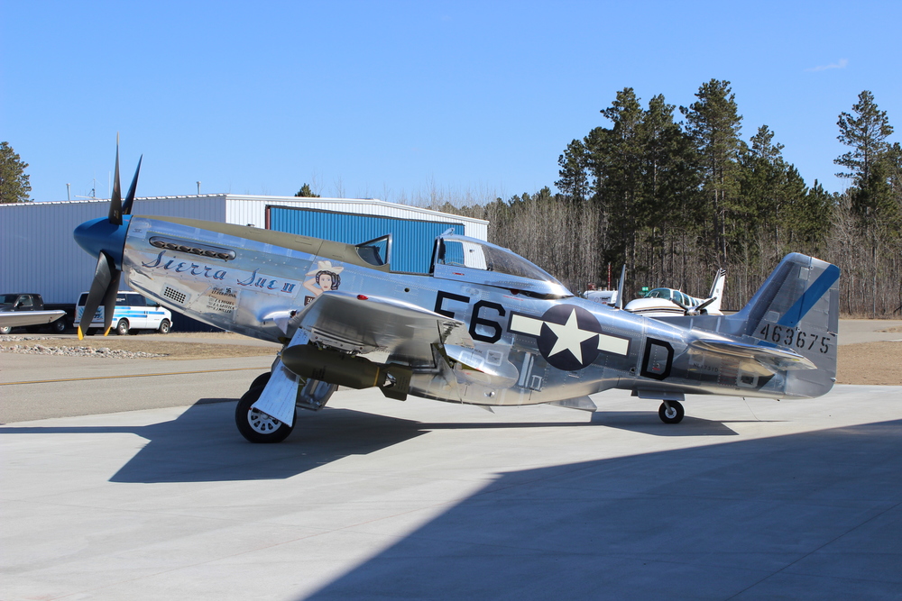 On the ramp in front of the AirCorps Aviation hangar