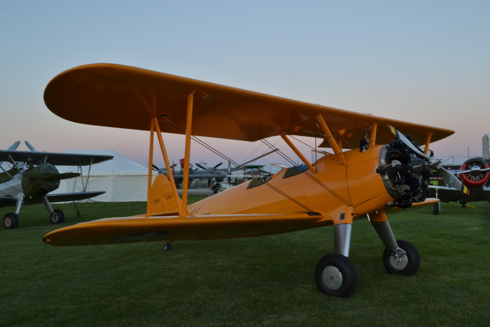 Twilight shot as BuAer 3347 sits in the trainer area at AirVenture 2015.   photo by our own Aaron Prince