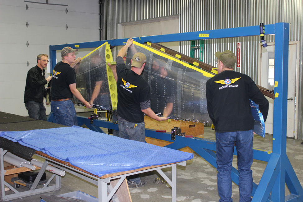 Ryan, Dalton, Randy, and Sam begin the move of the horizontal from the fixture to the bench.