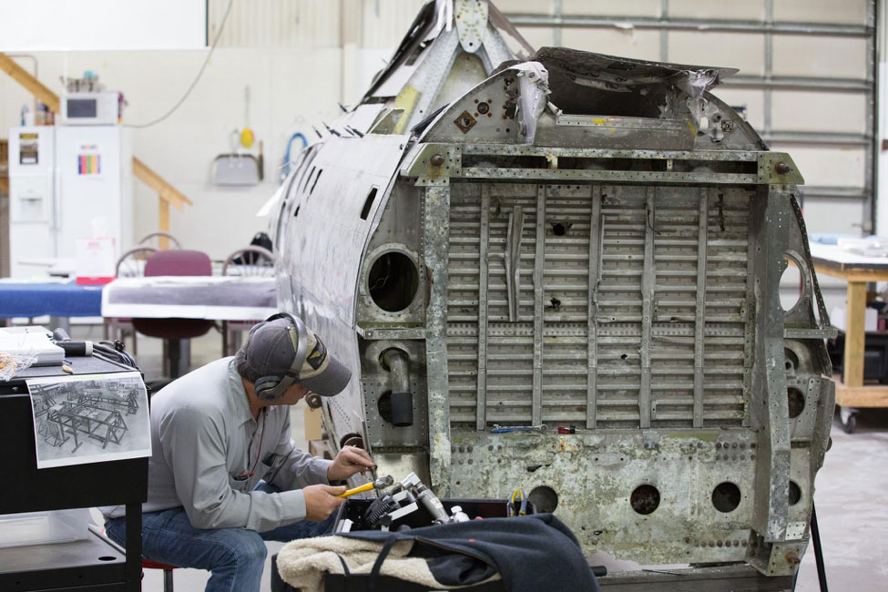 Robb begins the process of removing the fuselage skins.