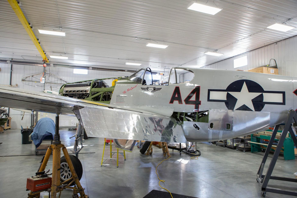 The supporting jacks hold the Red Tail’s main gear tires just a few inches off the floor. This will help make swinging the gear possible when the time comes.