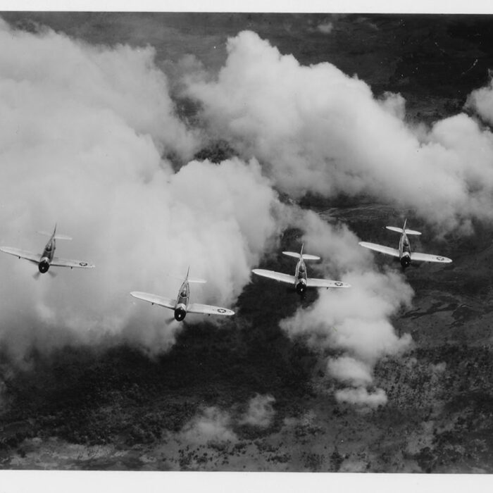 39th Fighter Squadron P-47s fly over Papua New Guinea