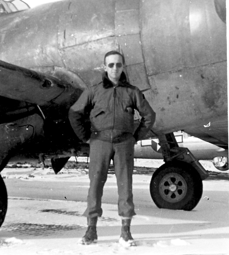 Lt. McKenna in front of a P-47